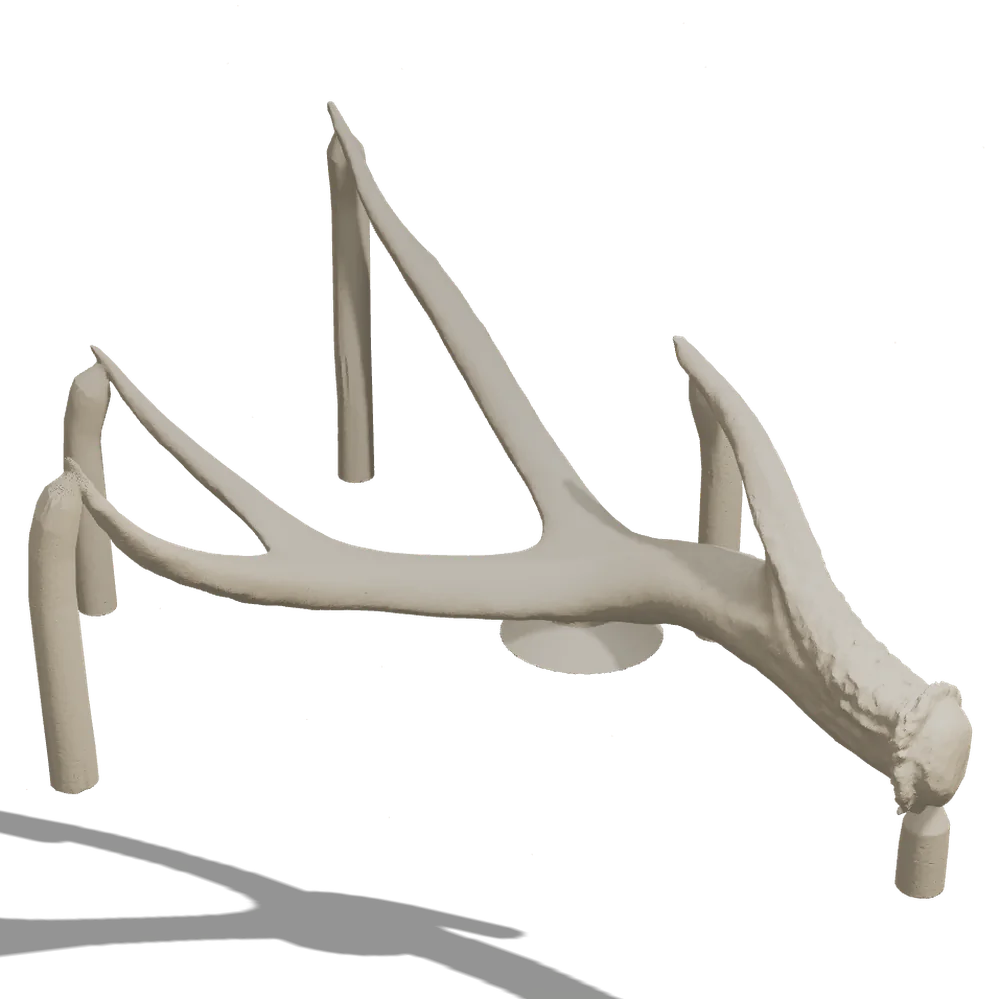 The 3D-printed sacrificial pattern of the antler, with its pouring funnel, feeds, and vents.